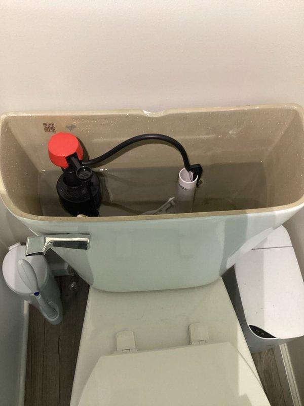 Responded to no hot water complaint following recent AC installation in tight workspace. Upon arrival, inspected gas water heater and verified gas control valve had been inadvertently switched to off position, likely bumped during AC installation work. Restored gas supply to water heater, relit pilot light, and verified proper operation and hot water delivery to fixtures throughout home.