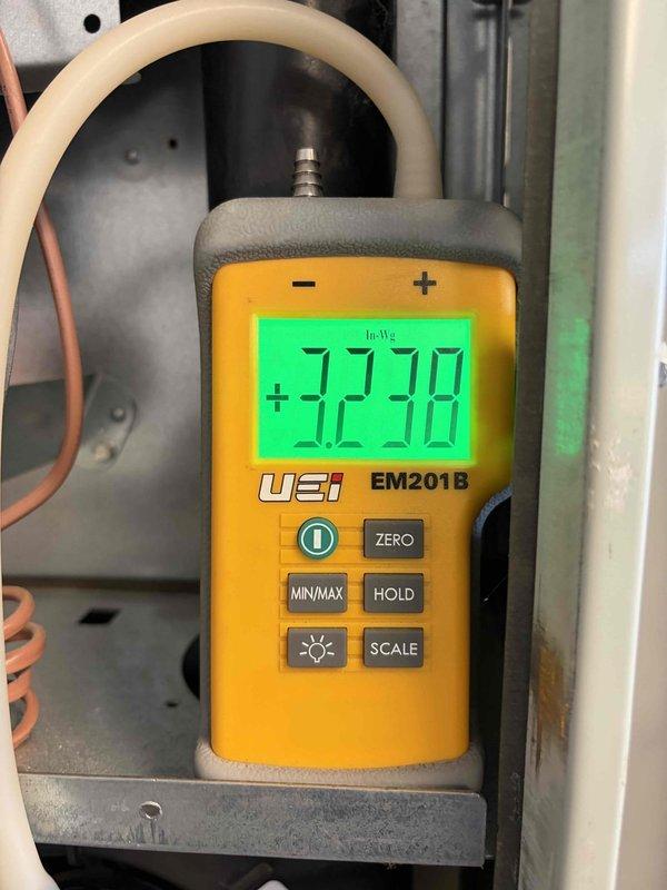 Performed second opinion inspection on gas furnace following previous contractor's diagnosis of cracked heat exchanger. Conducted comprehensive system evaluation including visual inspection of heat exchanger, burner operation analysis, and pressure differential testing using digital manometer which measured +32.38 InWg. Observed all three burner assemblies firing with proper blue flame characteristics and normal combustion patterns. Documented findings with photographic evidence of burner operation and diagnostic measurements for customer review. Coordinated with sales representative for equipment replacement consultation.