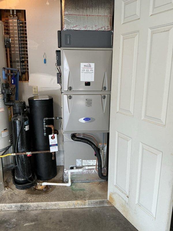 Completed full HVAC system replacement including installation of Carrier Performance Series two-stage air conditioner (model 26TPA848W003), Carrier Infinity Series two-stage gas furnace (model 59TN7A100C21-22), and Carrier evaporator coil (model CVAVA4821XMA). Removed and recycled existing equipment, installed new 2" PVC condenser pad, and supplied new disconnect and whip for outdoor unit. Reconnected to existing line set after flushing and pressure testing refrigerant lines, reconnected existing supply and return ductwork to new furnace installation. Performed duct cleaning service on 25 openings throughout the system. Retained existing Carrier thermostat per customer preference and explained system operation. Applied floor protection during installation, cleaned work area upon completion, and obtained necessary permits. Senior technician conducted post-installation walk-through and quality assurance inspection. System tested and verified proper operation with diagnostic equipment, co