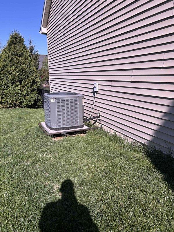 Responded to a tech lead request for counter sales consultation. Conducted site assessment of residential HVAC system, documenting exterior air conditioning unit installation with electrical disconnect and conduit routing on vinyl-sided structure. Performed interior evaluation of basement mechanical room, measuring existing white PVC drainage piping configuration connected to HVAC condensate system to provide accurate specifications for required materials or replacement components.