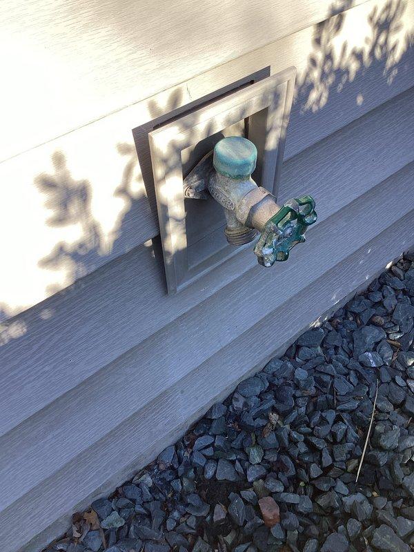 Responded to water leak complaint involving two exterior freeze-proof spigots. Upon inspection, found significant corrosion and oxidation on both hose bibs, with visible turquoise-green patina indicating advanced deterioration of brass components. Assessed valve bodies, handles, and spout assemblies for leak sources. Documented existing conditions showing weathered fixtures with compromised sealing surfaces due to mineral buildup and metal degradation. Evaluated whether rebuild kits would provide adequate repair solution versus full fixture replacement given extent of corrosion observed on valve stems and bonnets.