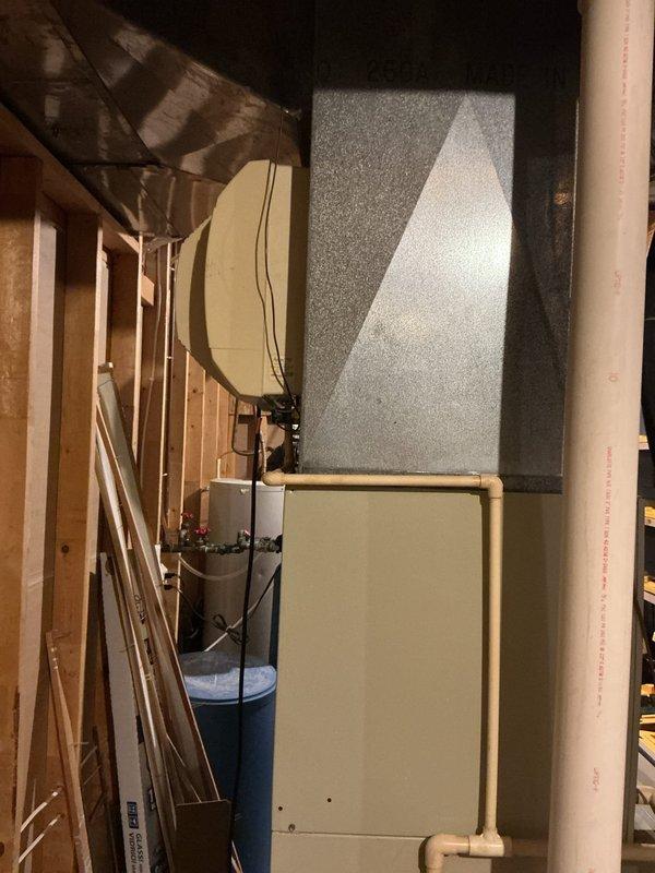 Completed on-site assessment of existing Carrier furnace and air conditioning system for full HVAC replacement estimate. Evaluated current equipment condition, ductwork configuration, and installation environment in basement utility area. Documented existing system specifications, venting arrangements including PVC condensate lines, and spatial requirements for new equipment installation. Provided comprehensive replacement options and recommendations to customer who is comparing multiple contractor proposals.
