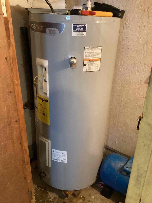 Responded to callback regarding no hot water issue following previous repairs to customer's self-installed water heater. Upon arrival, inspected AO Smith 100-gallon water heater and associated plumbing connections. Evaluated copper piping, pressure fittings, and system components for proper installation and function. Documented existing conditions including corroded pipes with visible oxidation and deteriorated gaskets at connection points. Assessed water heater operation, temperature controls, and pressure tank configuration to diagnose hot water failure and determine whether unit required replacement or additional repairs could resolve the issue.