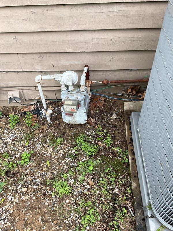 Provided estimate for installation of customer-supplied REMC electric tank water heater in basement location. Assessed existing A.O. Smith electric water heater currently elevated on brick platform with integrated Kenetico water softener system connection. Evaluated installation requirements including electrical connections, water supply lines with flexible braided hoses, pressure tank configuration, and proper integration with existing water softener plumbing to prepare comprehensive installation quote for customer-provided unit.