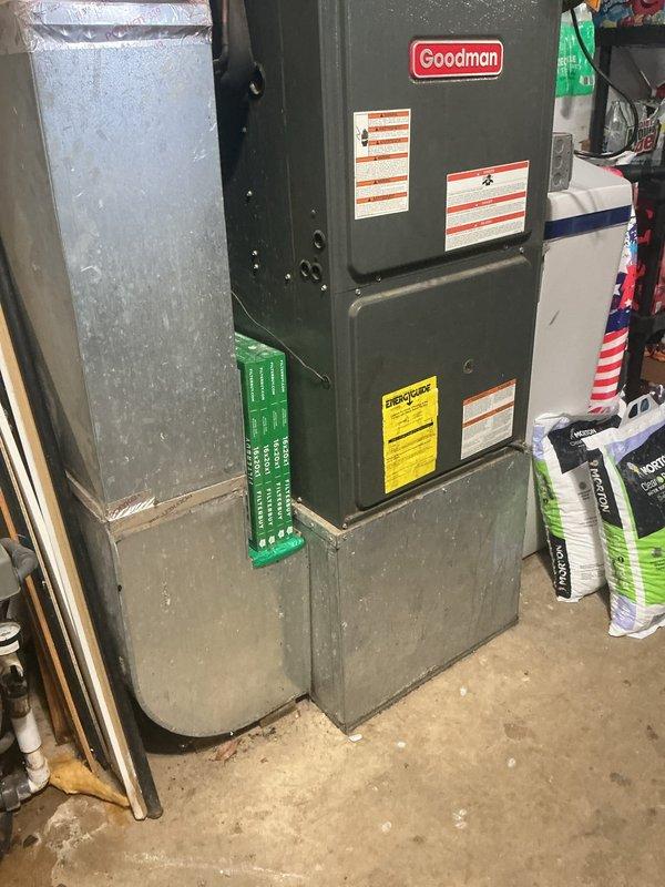 Conducted comprehensive assessment of non-functional residential air conditioning system and existing Goodman furnace installation. Evaluated current HVAC equipment configuration, including air handler, ductwork connections, and overall system integration within basement utility space. Measured existing equipment dimensions and clearances to determine replacement specifications for both AC-only and combined AC/furnace replacement options. Documented existing Goodman furnace unit condition, duct connections, filter accessibility, and installation platform. Inspected mechanical components, including blower assembly, flexible connections, and ventilation pathways to assess compatibility requirements for potential system upgrades. Provided detailed replacement estimates addressing immediate cooling system failure and presenting options for comprehensive HVAC system replacement.