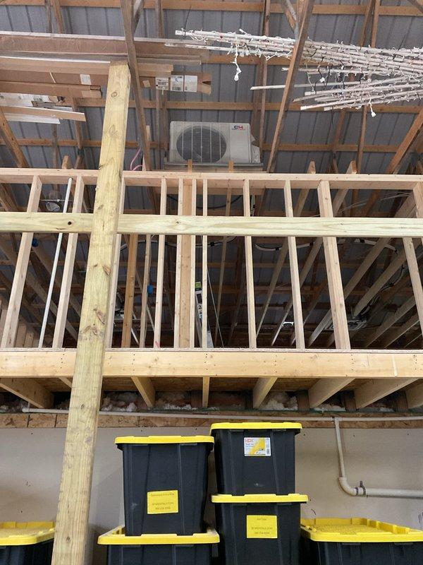 Completed installation of customer-supplied ductless mini split system in active construction environment, including two outdoor condensing units and four ceiling cassette air handlers with corresponding line sets, condensation drain lines, and control wiring. Mounted equipment to exposed wooden framing structure, installed two drip pans for condensate management, and performed system startup and commissioning. Secured all necessary permits and verified proper operation of all components with customer-supplied electrical power.