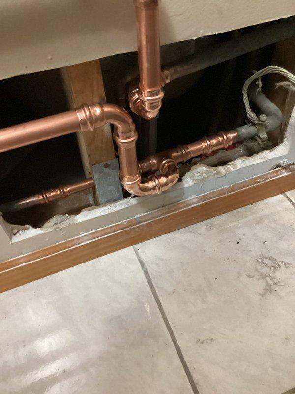 Completed installation and hook-up of water softener and water heater system, coordinating with city utilities for proper connection and inspection. Installed new copper supply piping with appropriate fittings, shut-off valves, and connections to integrate both units into the existing plumbing infrastructure. All work was scheduled as first appointment to accommodate required city coordination and ensure proper system activation.
