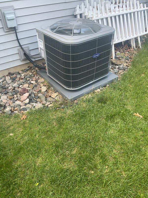 Completed full HVAC system replacement including installation of Carrier 26SCA436N003 Comfort Series single-stage air conditioner, Carrier CVAVA3617XMA evaporator coil, and Carrier 59TP7A080V17-16 Performance 97 Series two-stage gas furnace with 80,000 BTU input capacity. Removed and recycled existing equipment, then reconnected system to existing supply and return ductwork. Installed new 2-inch PVC condenser pad for outdoor unit placement, reconnected to existing refrigerant line set after flushing and pressure testing to verify system integrity. Installed new electrical disconnect and whip for outdoor unit, ensuring proper power supply and code compliance.

Mounted Honeywell T6 thermostat and programmed system settings for optimal two-stage furnace operation. Completed furnace changeout utilizing standard installation kit for 80% to 97% efficiency upgrade. Reconnected gas supply line with proper shut-off valves and tested for leaks. Installed and routed white PVC venting pipes for hi