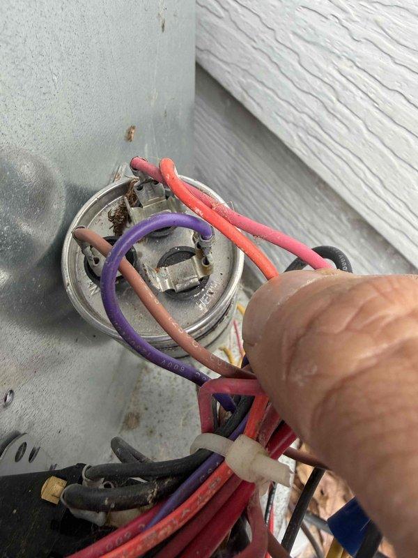Completed preventive maintenance on cooling system including inspection of outdoor condenser unit. Removed and cleaned air filter screen which showed accumulation of leaves and debris from landscaping area. Performed electrical diagnostics on outdoor unit components using multimeter to verify proper voltage and amperage readings at capacitor and other critical electrical connections. All system components tested within normal operating parameters and unit returned to full operational status.
