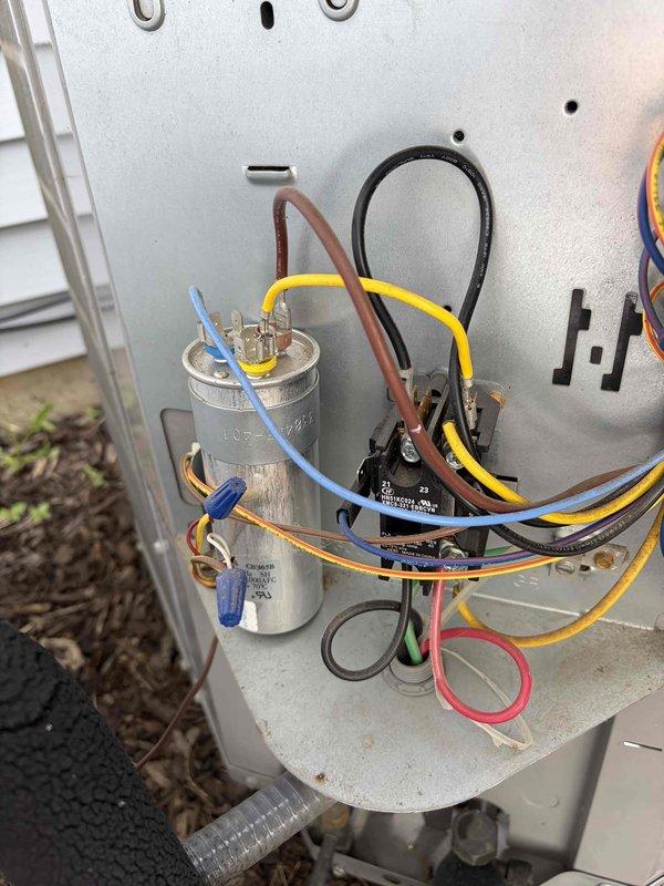 Completed comprehensive AC tune-up and cooling system inspection as part of preventive maintenance program enrollment. Performed electrical diagnostics using clamp meter to verify proper amperage draw and system performance, inspected capacitor and contactor assembly with all wire connections, and confirmed all components operating within manufacturer specifications. System tested and found functioning properly with no issues identified during this first scheduled maintenance visit.