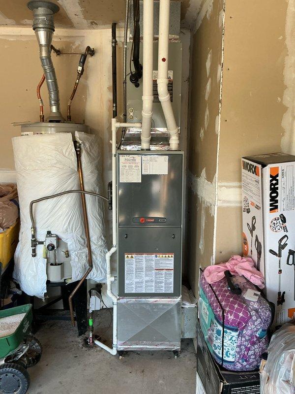 Responded to customer request for replacement estimate while technician was onsite. Evaluated existing outdoor air conditioning unit with failing compressor and indoor evaporator coil. Assessed current Trane furnace system and determined compatibility requirements for new equipment. Documented equipment conditions through photographs and provided comprehensive replacement quote for complete air conditioning system including outdoor condensing unit and indoor evaporator coil to address compressor failure.
