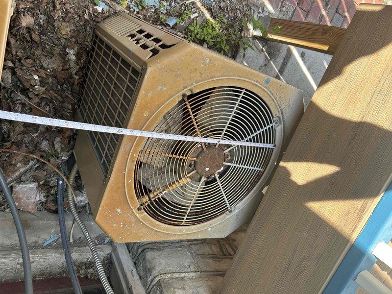 Conducted comprehensive HVAC replacement estimate for 132-year-old Queen Anne Victorian home currently served by dual-zone system with basement unit for first floor and attic unit for second and third floors. Assessed existing aged outdoor condensing unit showing significant weathering, corrosion on fan guard, and overall system degradation. Evaluated property layout, structural considerations for historic home, and discussed low-carbon environmental options including heat pump technology and high-efficiency equipment suitable for multi-story application with customer possessing engineering background.