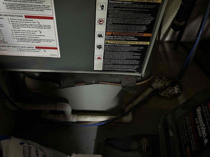 Conducted on-site evaluation of existing 25-year-old gas furnace and heat pump system to provide replacement estimate. Documented current equipment conditions, including furnace with PVC venting and gas line connections, along with existing heat pump unit. Assessed mechanical room layout and existing infrastructure to determine replacement requirements and compatibility for new HVAC system installation.