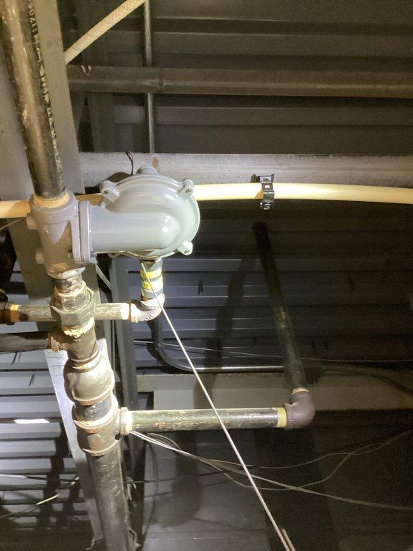 Replaced defective gas regulator on commercial HVAC system and reconnected gas vent piping to exterior termination point. Verified proper gas pressure at equipment and confirmed all connections were secure and code-compliant upon completion.