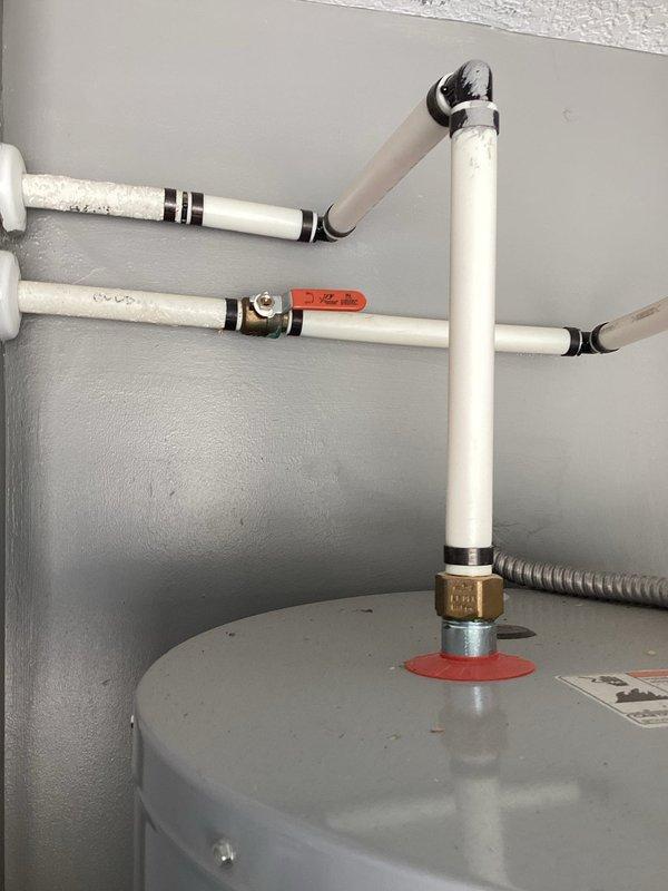 Completed preventive maintenance plumbing service on electric tanked water heater located in garage. Performed standard water heater flush procedure to remove sediment buildup and maintain optimal heating efficiency. Inspected plumbing connections, PVC piping configuration, shut-off valves, and pressure relief components for proper operation and signs of wear. All systems found functioning correctly with no leaks detected at connections or fittings.