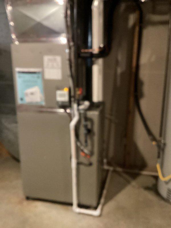 Completed full HVAC system replacement in basement mechanical room, installing Carrier Infinity Series variable-speed air conditioner (26VNA136W003), 98% AFUE modulating gas furnace (59MN7C080C17--14), evaporator coil (CVAVA4217XMA), and Infinity System Controller with WiFi capability (SYSTXCCITC01-C). Removed and recycled existing equipment, reconnected to existing line set with complete flush and pressure test to ensure refrigerant system integrity. Installed new electrical disconnect and whip, ran PVC condensate drainage, and integrated all components into communicating system architecture. Configured thermostat with full system programming and provided operational training. Registered all equipment warranties and obtained required permits. Senior technician performed post-installation quality assurance inspection and system performance verification.