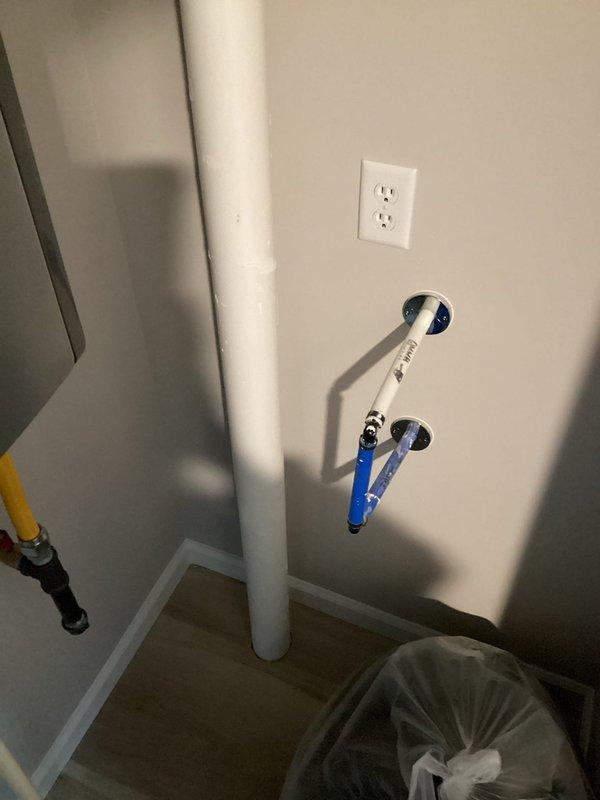 Conducted site assessment for water softener installation at residential property. Evaluated existing plumbing configuration including tankless water heater setup, PVC piping system, and available space for equipment placement. Documented current water supply connections, electrical outlet locations, and determined optimal installation point for water softening system based on main water line access and utility room layout.