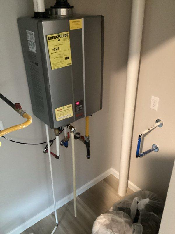 Conducted site assessment for water softener installation at residential property. Evaluated existing plumbing configuration including tankless water heater setup, PVC piping system, and available space for equipment placement. Documented current water supply connections, electrical outlet locations, and determined optimal installation point for water softening system based on main water line access and utility room layout.