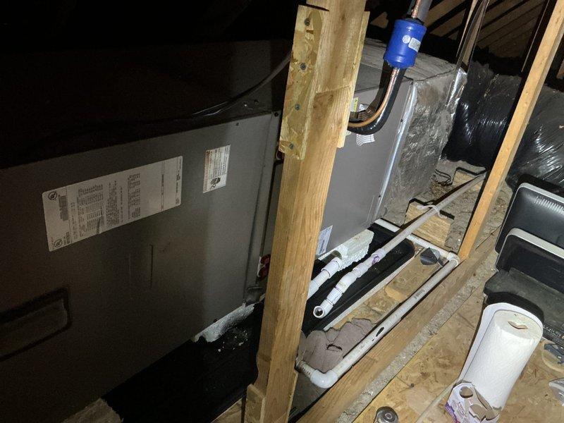 Conducted on-site evaluation for complete HVAC system replacement involving heat pump and air handler installation. Assessed existing attic-mounted air handler unit and determined specifications for appropriate replacement equipment. Documented current system configuration including ductwork connections, electrical components, and clearance requirements for new installation. Prepared comprehensive estimate for heat pump and air handler replacement based on home's heating and cooling requirements.