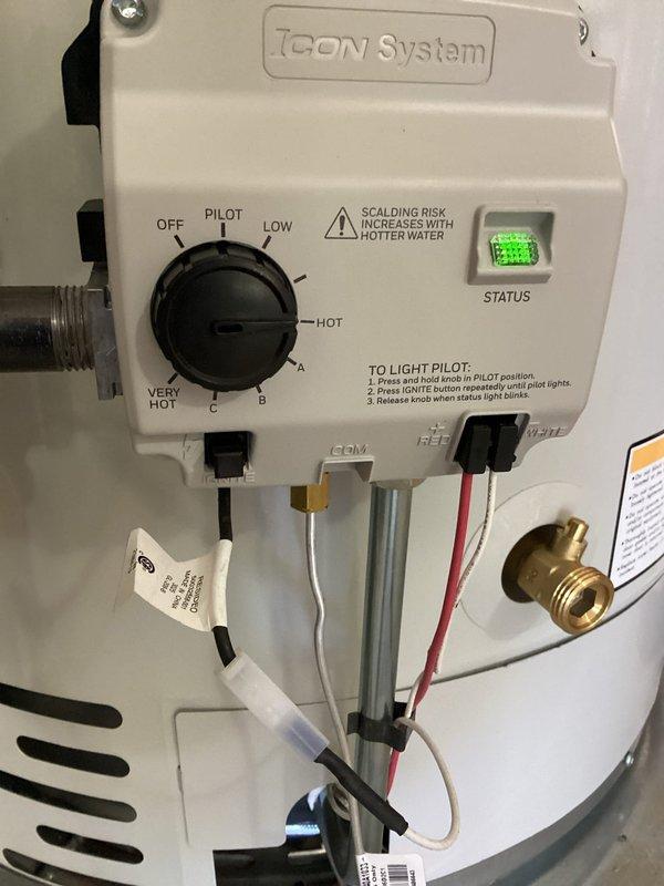 Installed 50-gallon short natural gas water heater with ICON System control panel featuring adjustable temperature settings and electronic ignition. Replaced aging main water valve to ensure proper shutoff capability for the new installation. Coordinated with municipal water department for main water shutoff at the street, obtained necessary permit, and completed installation with all gas connections, water supply lines, and venting configured to code specifications.