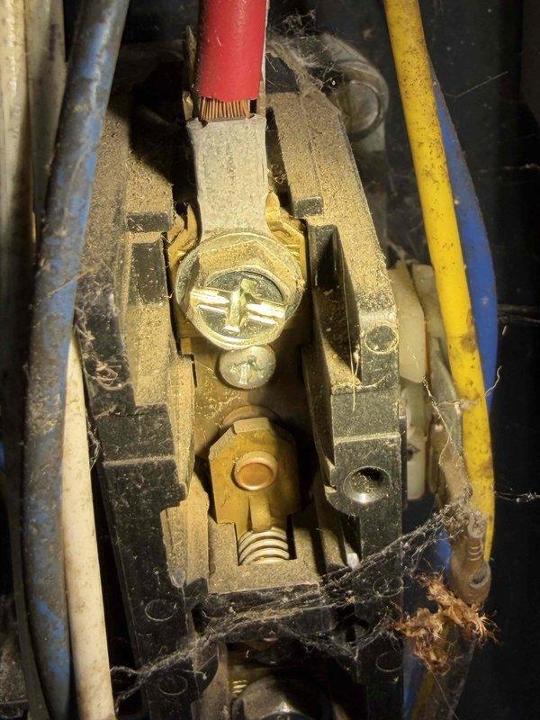 Completed comprehensive cooling system maintenance inspection during scheduled preventative maintenance visit. Performed electrical diagnostics using digital multimeter to verify proper voltage and capacitance readings at terminal connections, ensuring all electrical components were operating within manufacturer specifications. Inspected and documented condition of wiring, terminal blocks, and capacitor assembly, noting normal wear consistent with system age but all components functioning properly.