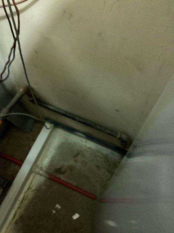 Conducted on-site assessment of existing A.O. Smith tank-style water heater installation located in utility closet to provide estimate for tankless water heater replacement. Evaluated current plumbing configuration including copper water supply lines, PVC venting system, and available space constraints within the mechanical room shared with HVAC equipment. Documented existing installation setup and discussed tankless water heater options with homeowner to determine appropriate sizing and installation requirements for future replacement.