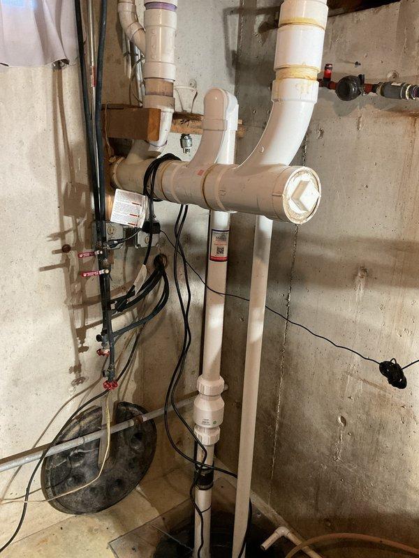 Completed follow-up visit to continue plumbing work from previous service call. Installed additional white PVC waste piping throughout basement utility area, including multiple elbow joints, connections, and fittings to extend the existing drainage system. Performed system flushing to verify proper flow and ensure all new connections were sealed and functioning correctly.
