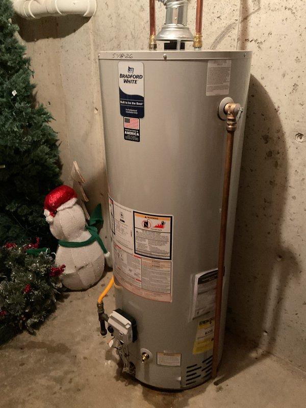 Successfully installed a 50-gallon natural gas water heater in the basement, including 8 feet of 3-inch galvanized flue pipe and appropriate copper supply connections with brass fittings. The installation required a two-person crew due to basement access constraints, and all work was completed under permit. Additionally, performed comprehensive plumbing maintenance inspection as part of the service visit, ensuring all residential plumbing systems were operating within specifications.