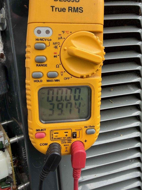 Completed scheduled air conditioning maintenance on cooling system. Performed comprehensive system diagnostics using digital multimeter to verify electrical readings and capacitor function, with measurements indicating proper voltage and capacitance levels. Utilized psychrometer to measure supply air temperature at 73°F, confirming adequate cooling performance. Inspected condenser coil fins and heat exchanger components for proper operation. System operating within normal parameters with maintenance agreement valid through June 2026.