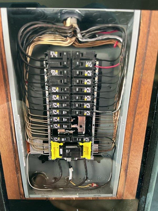 Replaced existing 100-amp electrical panel with new Square D 100-amp panel. Performed voltage testing to verify proper electrical connections and safely de-energized the system prior to panel replacement. Installed new circuit breakers, reorganized and terminated all branch circuit wiring to code specifications, and verified proper operation of all circuits upon completion.
