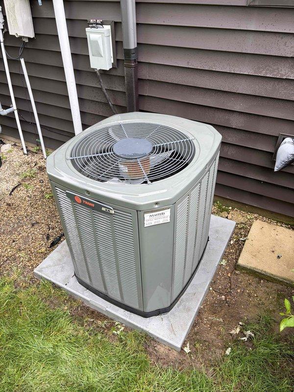 Completed routine cooling maintenance on residential Trane air conditioning system. Performed standard inspection of outdoor condenser unit, verified electrical connections at disconnect box, and tested system operation using digital multimeter to confirm proper amperage draw of 35.25 amps. All components functioning within normal parameters with no issues identified.