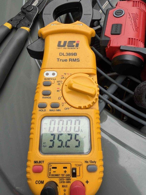 Completed routine cooling maintenance on residential Trane air conditioning system. Performed standard inspection of outdoor condenser unit, verified electrical connections at disconnect box, and tested system operation using digital multimeter to confirm proper amperage draw of 35.25 amps. All components functioning within normal parameters with no issues identified.