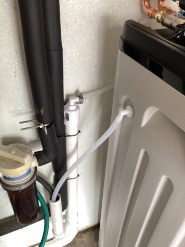 Successfully installed water softener system in utility area per customer specifications. Connected unit to existing plumbing infrastructure using copper supply lines and integrated with pre-existing filtration system. All connections secured and tested for proper operation.