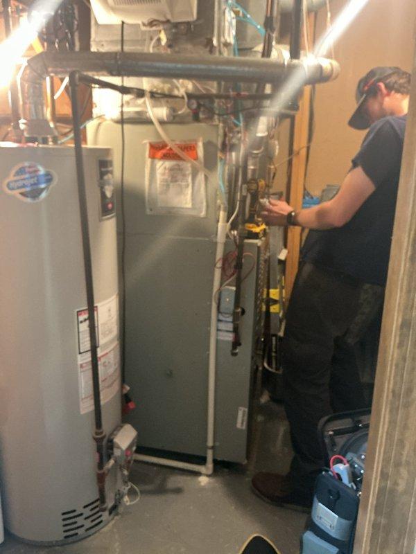 Conducted on-site assessment of existing HVAC system in basement mechanical room to provide replacement estimate for gas furnace and air conditioning unit. Evaluated current equipment configuration, ductwork layout, and utility connections including gas lines, electrical service, and condensate drainage to determine replacement requirements and specifications for new system installation.