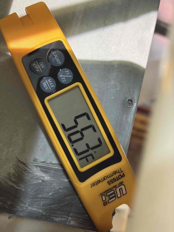 Responded to no cooling complaint on residential air conditioning system that had been previously diagnosed with a failed start capacitor. Upon arrival, performed comprehensive system diagnostics using digital manifold gauges and infrared thermometry. Verified system pressures and temperatures on R410A unit, confirmed proper refrigerant charge levels with both low and high-side readings at 124 psig, and measured supply air temperatures. Replaced defective start capacitor to restore compressor operation and returned system to normal cooling function.
