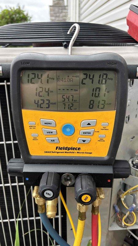 Responded to no cooling complaint on residential air conditioning system that had been previously diagnosed with a failed start capacitor. Upon arrival, performed comprehensive system diagnostics using digital manifold gauges and infrared thermometry. Verified system pressures and temperatures on R410A unit, confirmed proper refrigerant charge levels with both low and high-side readings at 124 psig, and measured supply air temperatures. Replaced defective start capacitor to restore compressor operation and returned system to normal cooling function.