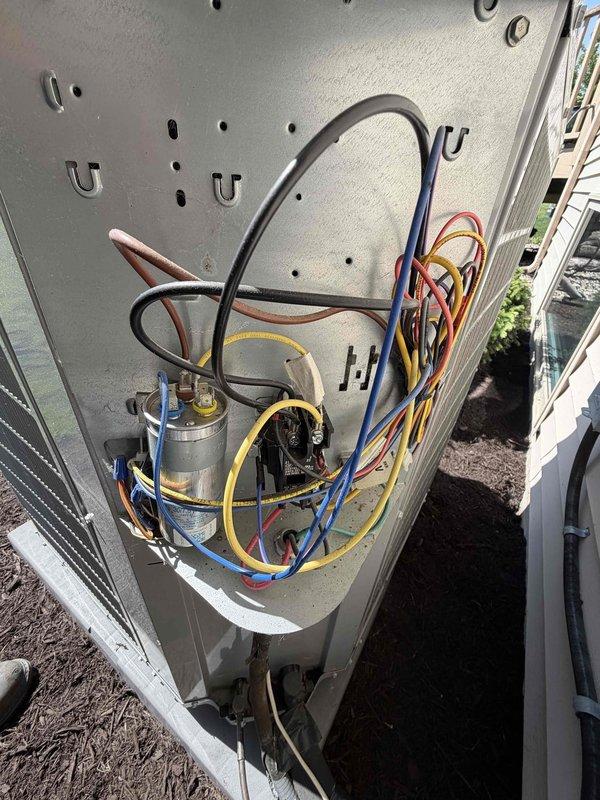 Completed prepaid preventive maintenance cooling system inspection on residential air conditioning unit. Performed comprehensive system evaluation including supply air temperature verification at 55°F, refrigerant line inspection, and outdoor condensing unit service check with manifold gauge set attached to measure system pressures and assess refrigerant charge levels. All components found operating within normal parameters with no deficiencies noted.