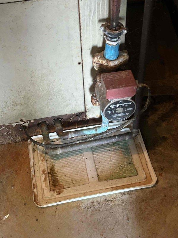 Conducted estimate for replacement of existing geothermal closed-loop system with pond loop configuration in all-electric residence. Inspected aging circulator pump, piping connections showing corrosion, and drainage components in basement utility area. Discussed efficiency concerns with current geothermal operation and presented alternative heating options including conversion to gas-fired equipment for customer consideration.