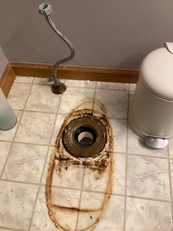 Responded to pre-sale home inspection requirements by resetting three toilets with new wax rings to ensure proper seals and prevent future leaks. Removed existing toilets, cleaned flange areas showing rust staining and corrosion from previous water exposure, installed new wax ring seals, and properly reinstalled and secured all three toilet units to manufacturer specifications. Work completed to satisfy inspection requirements prior to property closing.