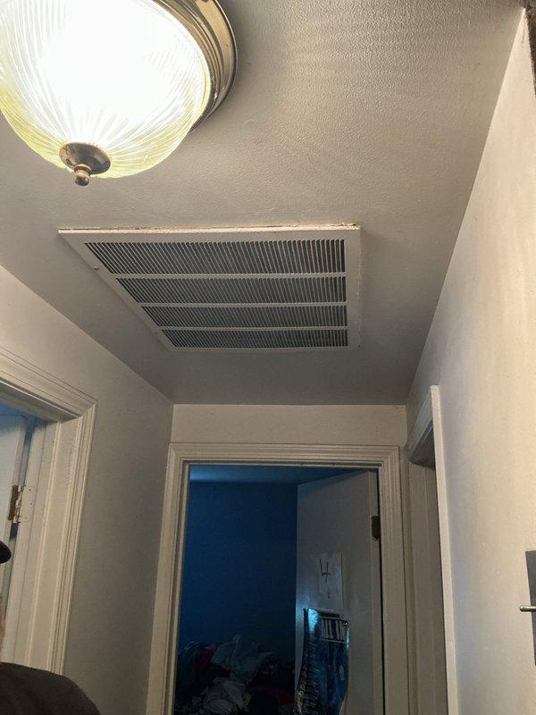 Conducted on-site assessment of residential HVAC system for equipment replacement estimate. Property has two air conditioning units with one unit experiencing performance issues and previously diagnosed as requiring three pounds of R-22 refrigerant. Evaluated existing system configuration, documented interior ductwork locations and supply registers, and inspected attic or ceiling-mounted equipment access points to provide comprehensive replacement options for aging R-22 system.