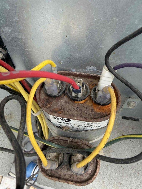 Completed return visit for AC maintenance and cleaning that was previously postponed due to customer's gas leak issue. Performed thorough system inspection, cleaning, and operational verification of cooling equipment. System tested and confirmed operating properly with temperature readings within normal parameters; noted aging transformer/capacitor showing significant rust and corrosion that should be monitored for future replacement.