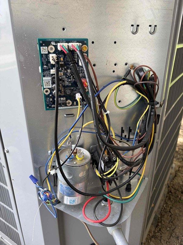 Performed first-visit cooling system maintenance on residential HVAC unit. Conducted electrical diagnostics using clamp meter to verify proper amperage draw on condenser fan motor and compressor circuit. Inspected internal components including control board, capacitor, and wiring connections; documented system condition with photos showing all electrical connections secure and heat exchanger coils in serviceable condition.