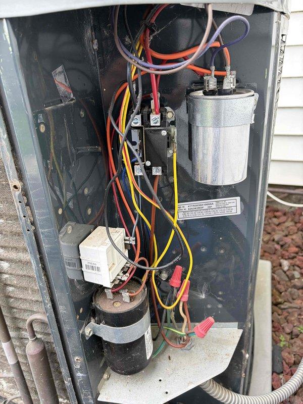 Completed comprehensive AC tune-up on outdoor condensing unit. Performed electrical diagnostics using digital clamp meter, verifying proper amperage draw and voltage readings across all components. Inspected and tested contactor relay, capacitor, and compressor start components, confirming all electrical connections were secure and functioning within normal parameters. Customer expressed interest in potential thermostat replacement for future consideration.