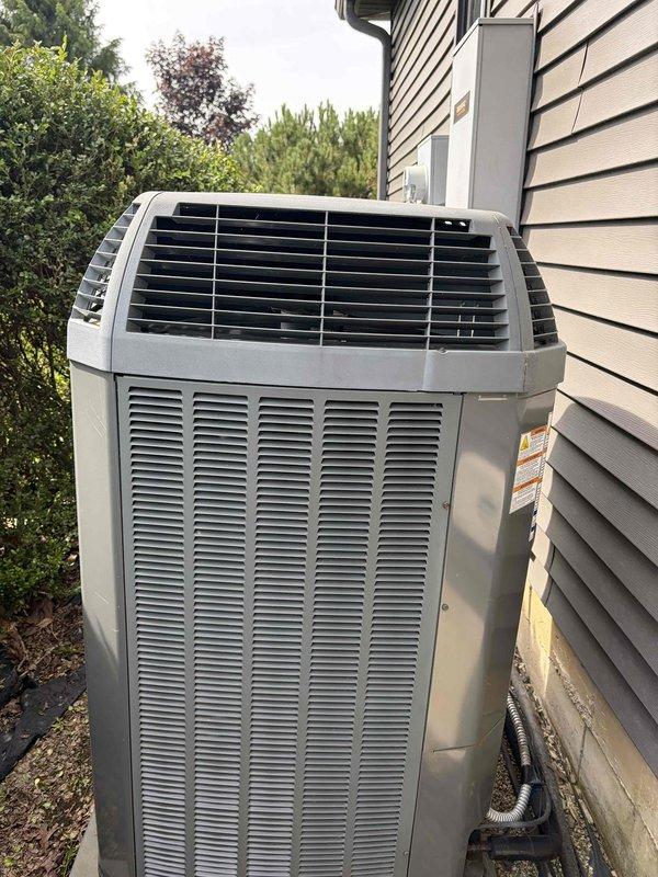 Completed seasonal cooling maintenance on residential HVAC system. Performed standard inspection of outdoor condensing unit, checked electrical connections and capacitor which showed signs of rust and corrosion on housing but remained operational. Noted capacitor condition for future monitoring and advised customer this was their final prepaid maintenance visit, with recommendation to renew membership for continued service coverage.