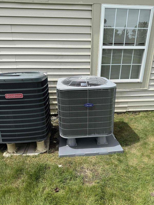 Completed installation of Carrier 1.5-ton, 15 SEER heat pump system with R454B refrigerant and Carrier 2.0-ton wall mount air handler equipped with 8kW electric heat strips. Reconnected unit to existing supply air ductwork and refrigerant line set, performed complete flush and pressure test to verify system integrity. Installed Honeywell T-6 digital thermostat and reconnected all existing high and low voltage wiring. Applied manufacturer identification labels to outdoor heat pump unit and verified all connections meet code requirements.