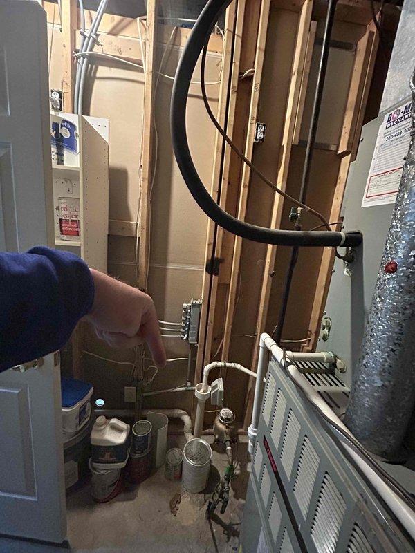Provided estimate for running a gas line from existing furnace area to adjacent room for installation of small gas stove in kitchenette. Assessed current gas supply configuration, existing mechanical room layout with water heater and HVAC equipment, and determined optimal routing for new gas line installation. Documented site conditions including basement framing, existing utility locations, and exterior access points to support accurate material and labor estimates for the proposed gas line extension work.