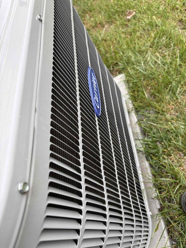 Completed routine air conditioning maintenance on Carrier outdoor condensing unit. Inspected electrical components including capacitor, contactor, and wiring connections within control panel, verifying all connections were secure and components functioning properly. Verified system operation and confirmed unit is operating within normal parameters through end of current maintenance agreement period.