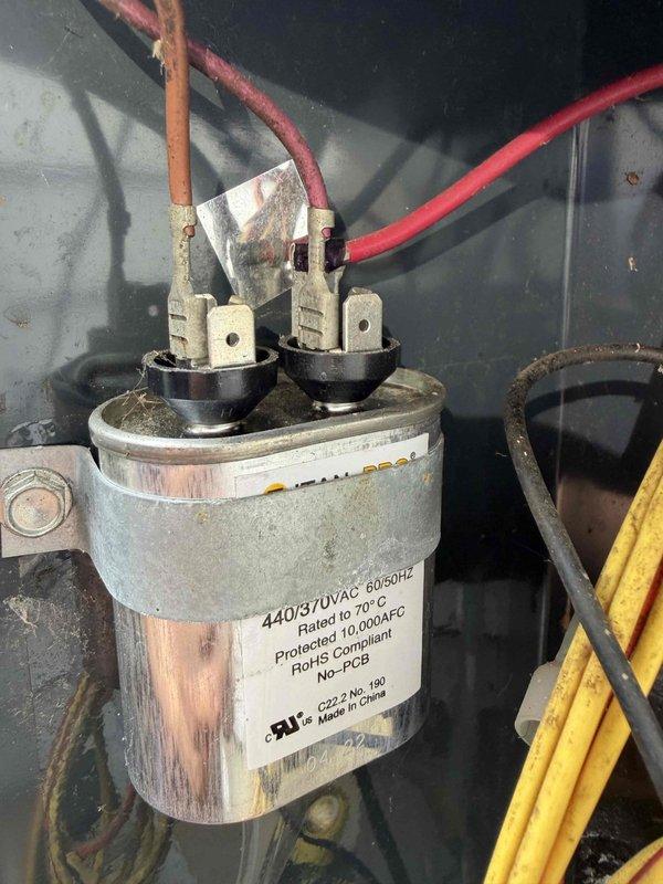 Completed scheduled heating maintenance visit that was converted to a cooling system inspection per customer request. Inspected HVAC system components including dual-run capacitor rated at 440/370VAC with proper wire connections intact and terminals secure. Verified system operational parameters and confirmed equipment functioning within manufacturer specifications following recent furnace installation.