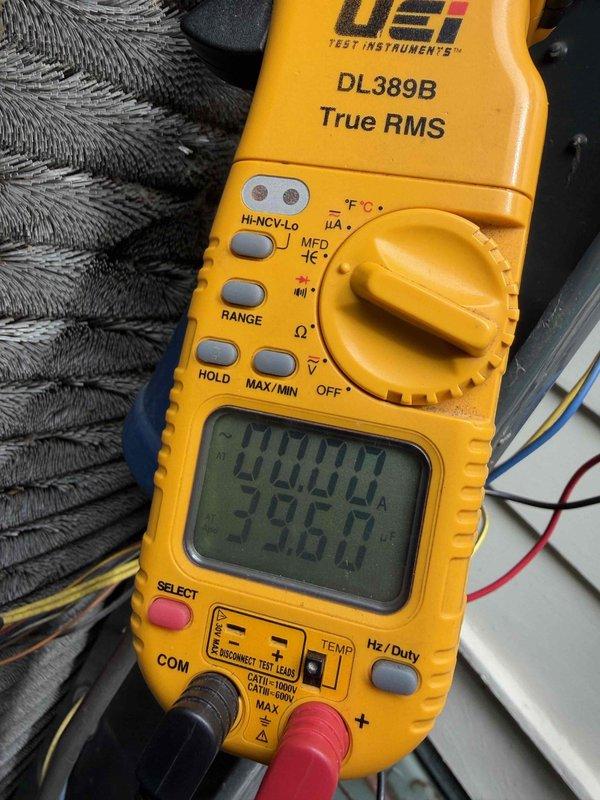 Completed first prepaid preventative maintenance visit on heat pump system. Performed comprehensive cooling season inspection including electrical diagnostics and amperage testing, measuring 398.0 amps on system components using digital multimeter. All measurements within manufacturer specifications, system operating properly for cooling season.