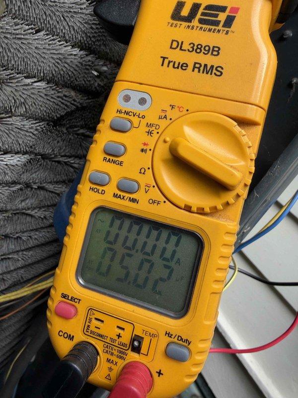 Completed first prepaid preventative maintenance visit on heat pump system. Performed comprehensive cooling season inspection including electrical diagnostics and amperage testing, measuring 398.0 amps on system components using digital multimeter. All measurements within manufacturer specifications, system operating properly for cooling season.